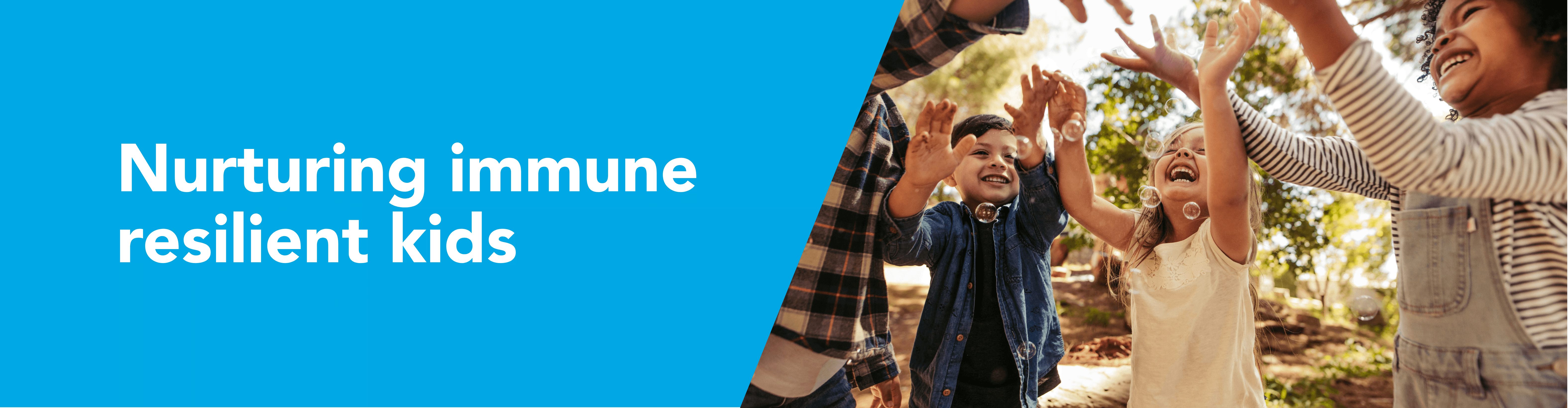 "Nurturing immune resilient kids". Photography of group of children playing with bubbles in the park.